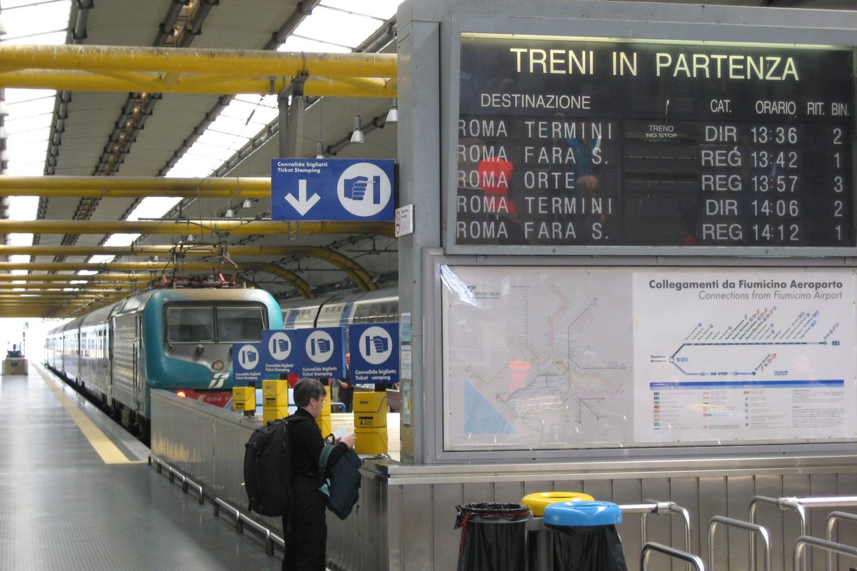 Departure board for trains at the station inside Rome Fiumicino airport