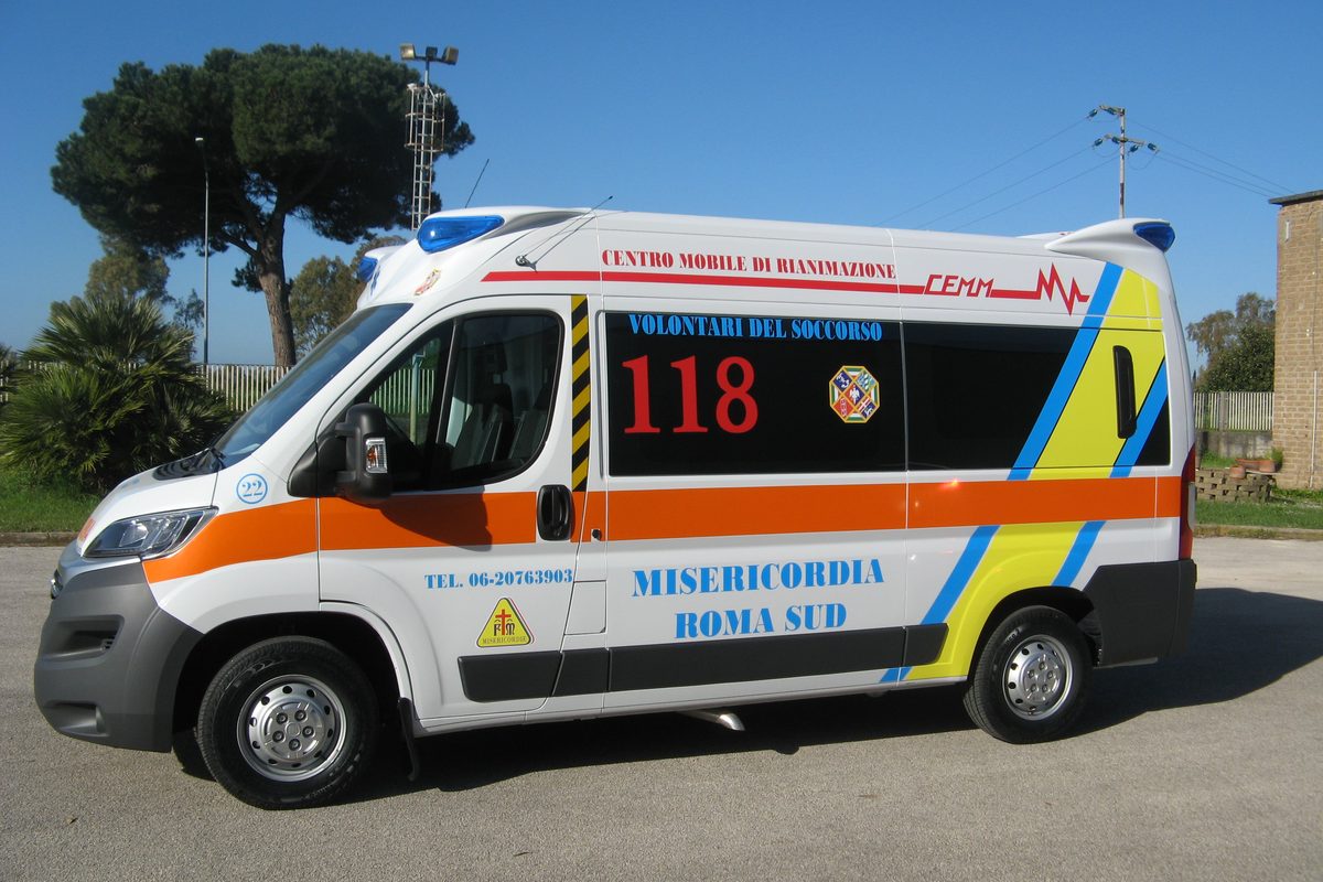 A white Misericordia ambulance with the 118 number on its side, in Rome