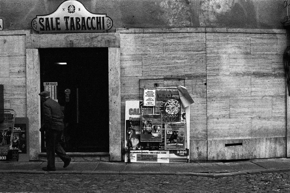 An old ornate «Sale Tabacchi» sign over a small shop in Asti