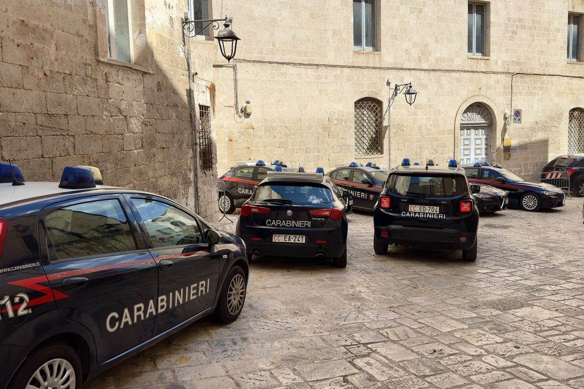 Several Carabinieri cars parked in a square in Monopoli, Puglia