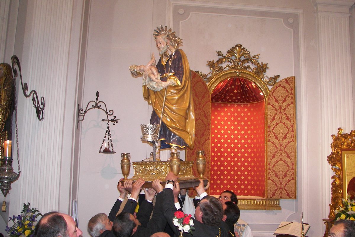 A statue of Saint Joseph carried back into its chapel at the end of a procession in Santa Maria di Licodia, Sicily