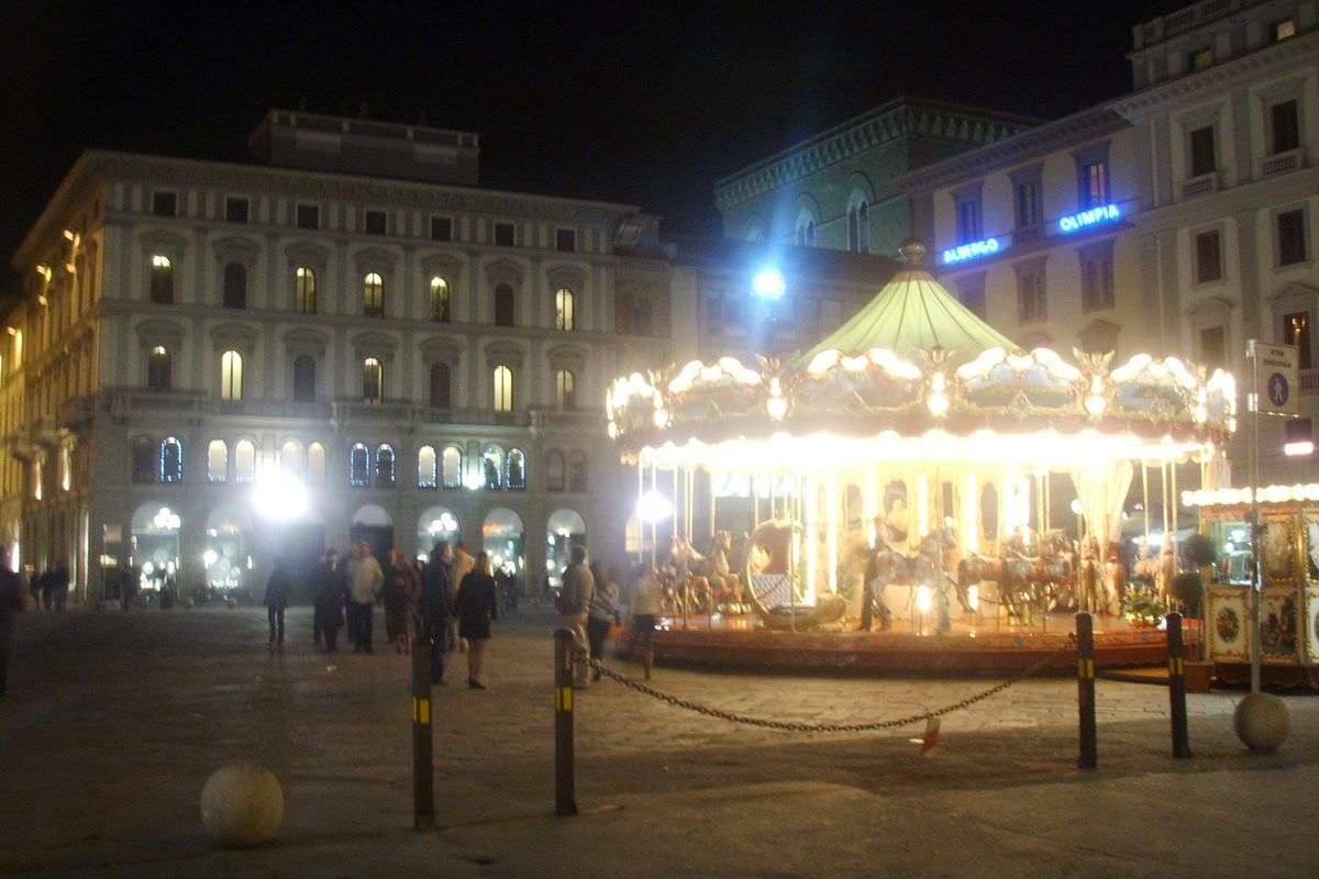 A lit carousel in Piazza della Repubblica in Florence at night