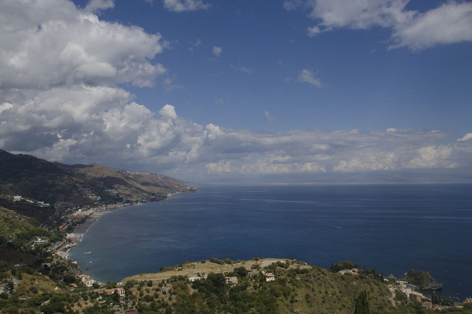 Coast looking northward from Taormina, Sicily. Compare to 1899 view (Sicilia, Italia)